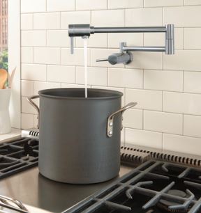 A pot  filler saves steps for the chef in a gourmet kitchen