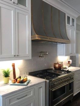 Custom range hoods are unique beautiful and pricey