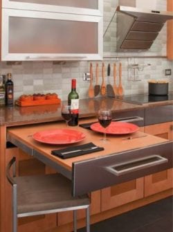 A pull-out table adds extra work and seating space in your new kitchen