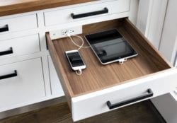 docking drawer charges phones out of sight