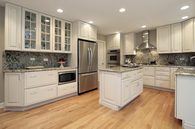 When planning your kitchen design, one of many decisions is whether or not to include wall cabinets