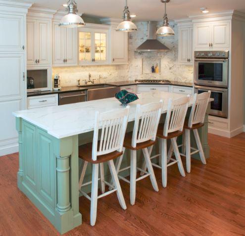 An island is a stylish addition to a farm-style kitchen