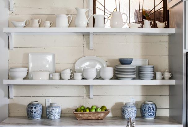 open shelves can be used instead of closed wall cabinets in a kitchen remodel